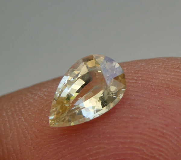 0.88CT UNHEATED PEAR CUT 100% NATURAL YELLOW CEYLON SAPPHIRE