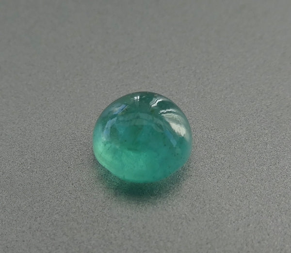 0.93CT SPLENDID ROUND CAB 100% NATURAL GREEN EMERALD