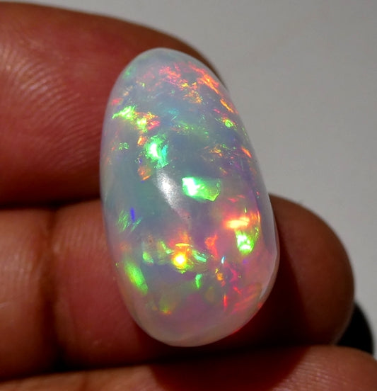 23.45CT UNTREATED RAINBOW FLASHING HUGE 100% NATURAL CRYSTAL OPAL