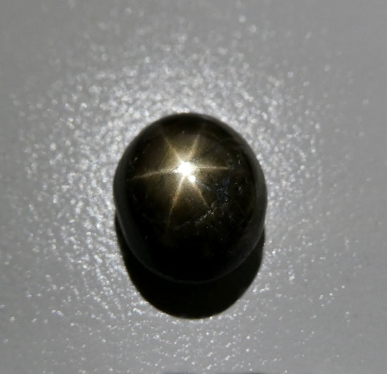 5.97CT UNHEATED OVAL 100% NATURAL 6 RAYS GOLDEN BLACK STAR SAPPHIRE