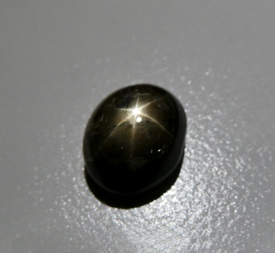 5.97CT UNHEATED OVAL 100% NATURAL 6 RAYS GOLDEN BLACK STAR SAPPHIRE