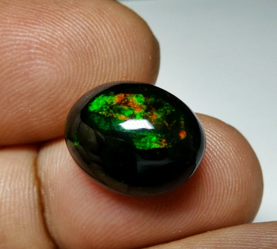 6.12CT UNHEATED RAINBOW STUNNER FLASHING 100% NATURAL ROUND BLACK OPAL