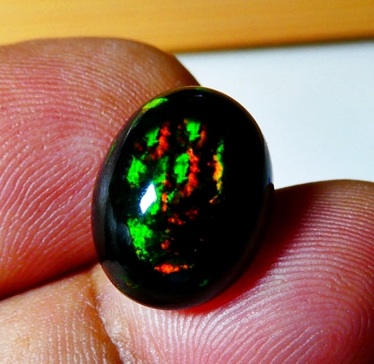 6.12CT UNHEATED RAINBOW STUNNER FLASHING 100% NATURAL ROUND BLACK OPAL