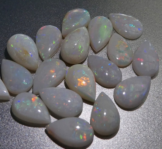 8.09CT SPLENDID PEAR 100% NATURAL MULTI COLOUR OPAL LOT