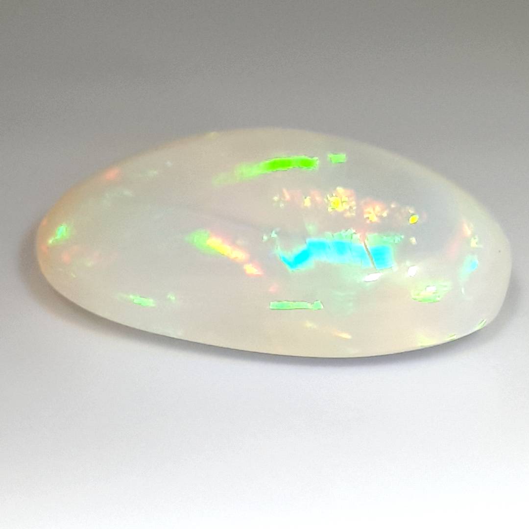 23.40CT RAINBOW FLASHING PATCHWORK HARLEQUIN CRYSTAL OPAL