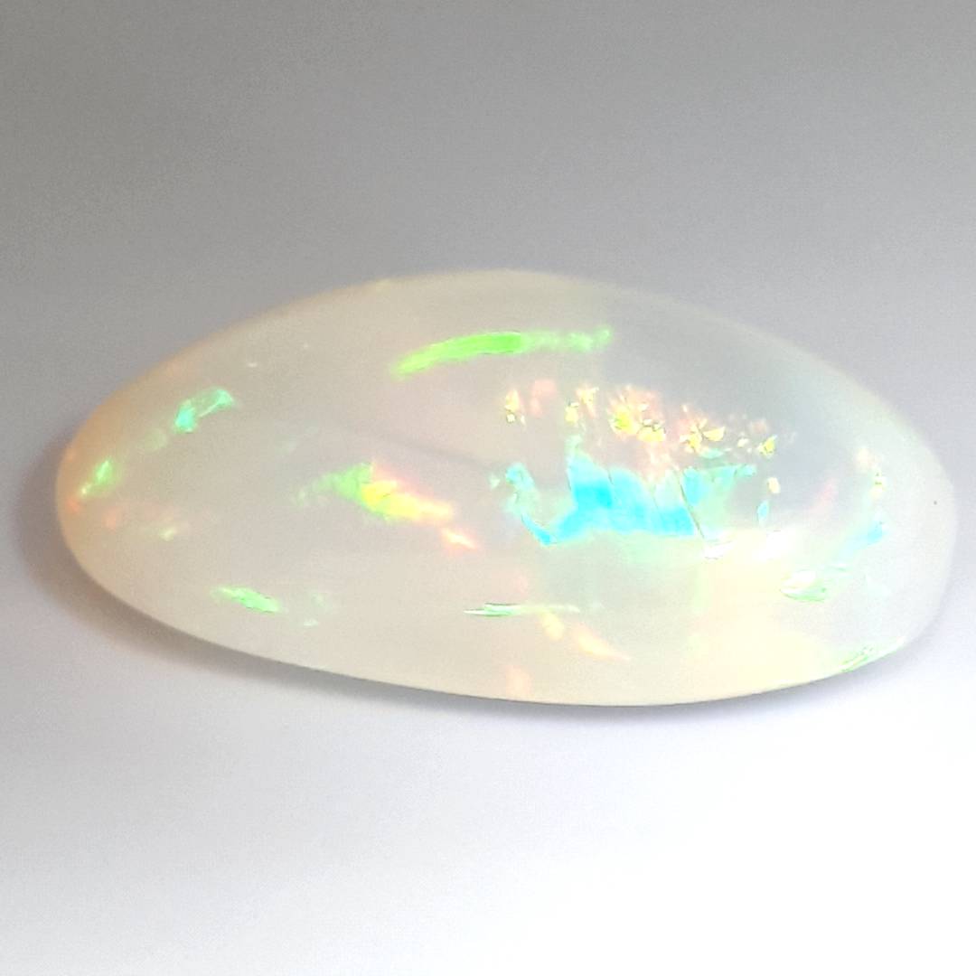 23.40CT RAINBOW FLASHING PATCHWORK HARLEQUIN CRYSTAL OPAL