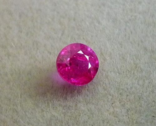 0.48CT GORGEOUS GLOWING RED ROUND RUBY – Gemstones Direct NZ Ltd