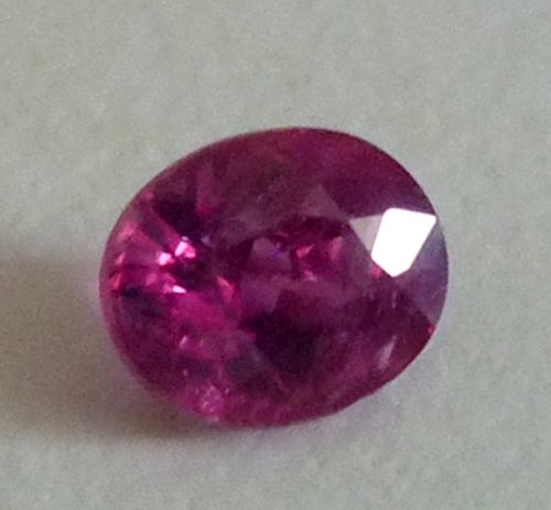 0.54CT UNHEATED BEAUTIFUL OVAL PURPLISH RED RUBY