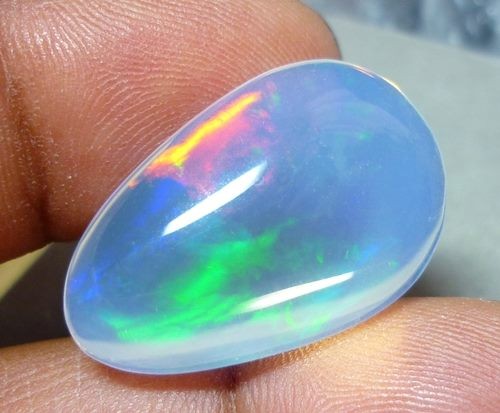 23.40CT RAINBOW FLASHING PATCHWORK HARLEQUIN CRYSTAL OPAL