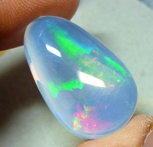 23.40CT RAINBOW FLASHING PATCHWORK HARLEQUIN CRYSTAL OPAL