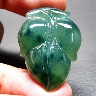 UNTREATED GLASSY GREEN NATURAL JADEITE PENDANT