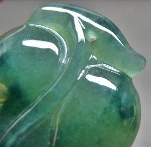 UNTREATED GLASSY GREEN NATURAL JADEITE PENDANT